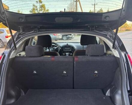 Чорний Ніссан Жук, об'ємом двигуна 1.6 л та пробігом 219 тис. км за 9999 $, фото 9 на Automoto.ua