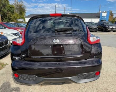 Чорний Ніссан Жук, об'ємом двигуна 1.6 л та пробігом 50 тис. км за 7000 $, фото 5 на Automoto.ua