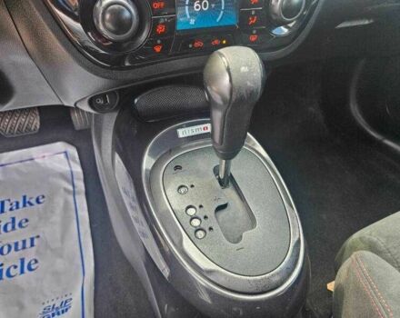 Черный Ниссан Жук, объемом двигателя 1.6 л и пробегом 88 тыс. км за 3950 $, фото 12 на Automoto.ua