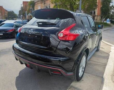 Черный Ниссан Жук, объемом двигателя 1.6 л и пробегом 88 тыс. км за 3950 $, фото 2 на Automoto.ua