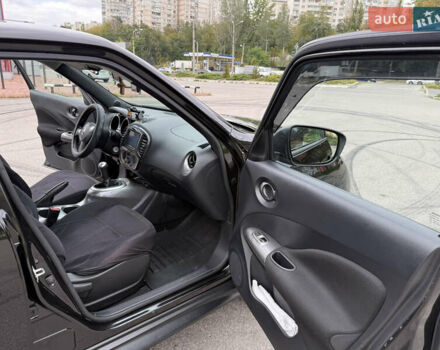 Черный Ниссан Жук, объемом двигателя 1.6 л и пробегом 80 тыс. км за 12222 $, фото 22 на Automoto.ua