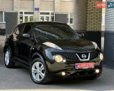 Черный Ниссан Жук, объемом двигателя 1.5 л и пробегом 229 тыс. км за 7800 $, фото 1 на Automoto.ua