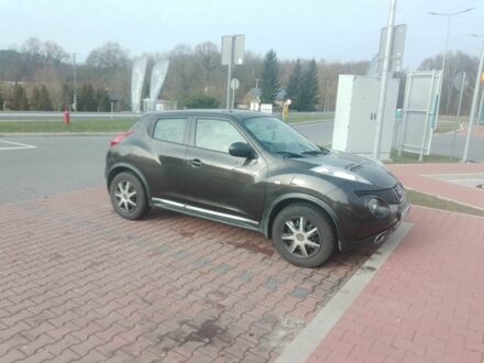 Черный Ниссан Жук, объемом двигателя 1.6 л и пробегом 210 тыс. км за 8500 $, фото 1 на Automoto.ua