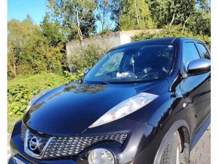 Черный Ниссан Жук, объемом двигателя 1.6 л и пробегом 300 тыс. км за 11517 $, фото 1 на Automoto.ua