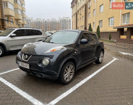 Черный Ниссан Жук, объемом двигателя 1.6 л и пробегом 270 тыс. км за 8500 $, фото 1 на Automoto.ua