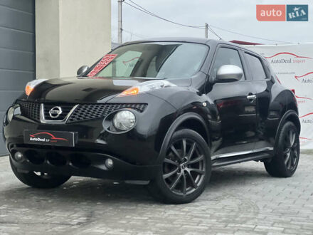 Черный Ниссан Жук, объемом двигателя 1.6 л и пробегом 190 тыс. км за 10850 $, фото 1 на Automoto.ua