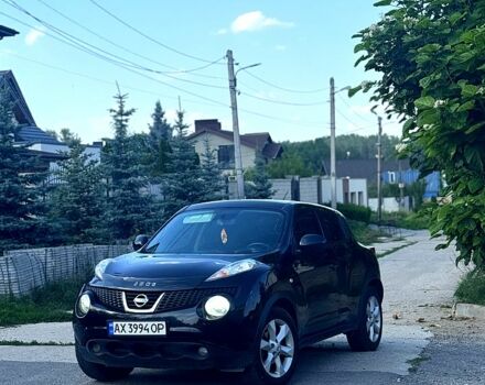 Черный Ниссан Жук, объемом двигателя 1.6 л и пробегом 195 тыс. км за 7500 $, фото 1 на Automoto.ua