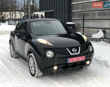 Черный Ниссан Жук, объемом двигателя 1.6 л и пробегом 155 тыс. км за 10390 $, фото 1 на Automoto.ua