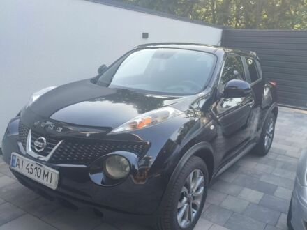 Черный Ниссан Жук, объемом двигателя 2 л и пробегом 155 тыс. км за 10200 $, фото 1 на Automoto.ua