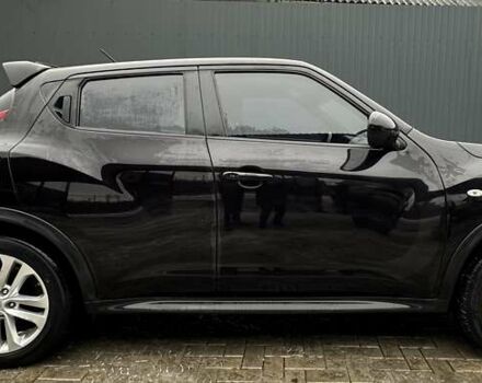 Черный Ниссан Жук, объемом двигателя 1.6 л и пробегом 100 тыс. км за 11000 $, фото 1 на Automoto.ua