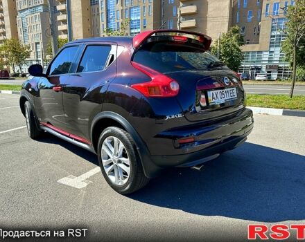 Фиолетовый Ниссан Жук, объемом двигателя 1.6 л и пробегом 109 тыс. км за 12000 $, фото 1 на Automoto.ua