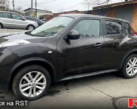 Коричневый Ниссан Жук, объемом двигателя 1.6 л и пробегом 130 тыс. км за 9500 $, фото 4 на Automoto.ua