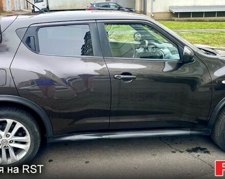 Коричневый Ниссан Жук, объемом двигателя 1.6 л и пробегом 130 тыс. км за 9500 $, фото 6 на Automoto.ua