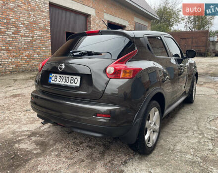 Коричневый Ниссан Жук, объемом двигателя 1.6 л и пробегом 105 тыс. км за 11000 $, фото 5 на Automoto.ua