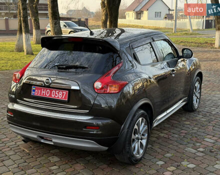 Коричневый Ниссан Жук, объемом двигателя 1.6 л и пробегом 158 тыс. км за 11400 $, фото 17 на Automoto.ua