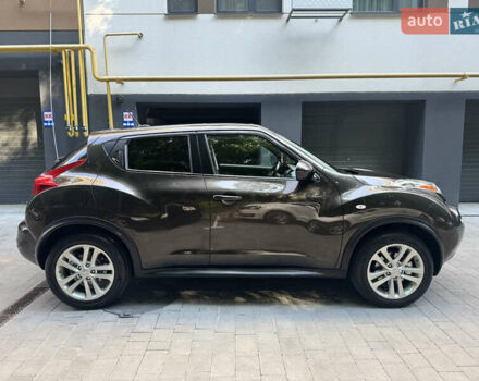 Коричневый Ниссан Жук, объемом двигателя 1.62 л и пробегом 230 тыс. км за 10300 $, фото 4 на Automoto.ua