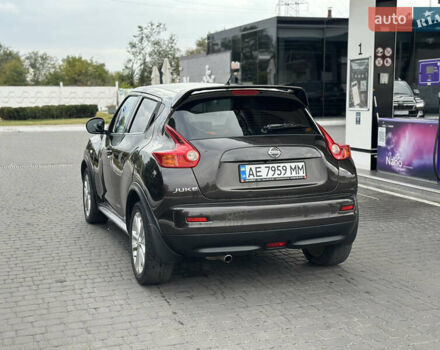 Коричневый Ниссан Жук, объемом двигателя 1.6 л и пробегом 162 тыс. км за 8600 $, фото 5 на Automoto.ua