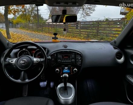 Красный Ниссан Жук, объемом двигателя 1.6 л и пробегом 131 тыс. км за 9990 $, фото 21 на Automoto.ua