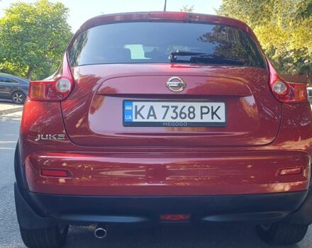 Красный Ниссан Жук, объемом двигателя 1.6 л и пробегом 135 тыс. км за 11500 $, фото 3 на Automoto.ua