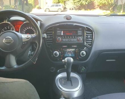 Красный Ниссан Жук, объемом двигателя 1.6 л и пробегом 135 тыс. км за 11500 $, фото 6 на Automoto.ua