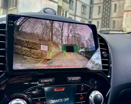 Червоний Ніссан Жук, об'ємом двигуна 1.6 л та пробігом 97 тис. км за 12000 $, фото 7 на Automoto.ua