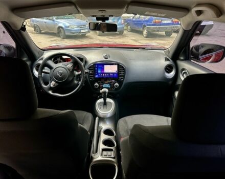 Червоний Ніссан Жук, об'ємом двигуна 1.6 л та пробігом 97 тис. км за 12000 $, фото 5 на Automoto.ua