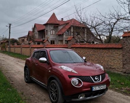 Червоний Ніссан Жук, об'ємом двигуна 1.6 л та пробігом 115 тис. км за 9300 $, фото 5 на Automoto.ua