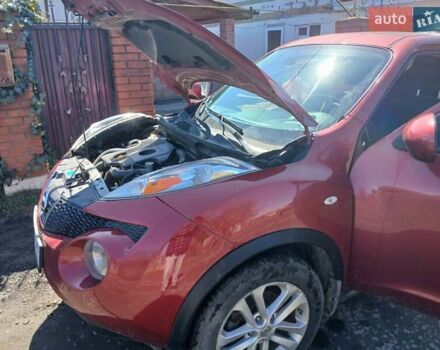 Красный Ниссан Жук, объемом двигателя 1.62 л и пробегом 170 тыс. км за 8999 $, фото 1 на Automoto.ua