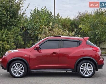 Красный Ниссан Жук, объемом двигателя 1.6 л и пробегом 216 тыс. км за 8999 $, фото 7 на Automoto.ua