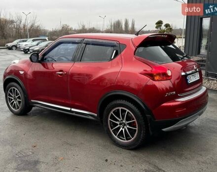 Красный Ниссан Жук, объемом двигателя 1.62 л и пробегом 130 тыс. км за 9999 $, фото 5 на Automoto.ua