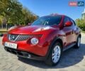 Червоний Ніссан Жук, об'ємом двигуна 1.62 л та пробігом 150 тис. км за 8699 $, фото 1 на Automoto.ua
