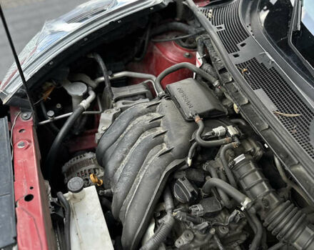 Червоний Ніссан Жук, об'ємом двигуна 1.6 л та пробігом 151 тис. км за 10000 $, фото 18 на Automoto.ua