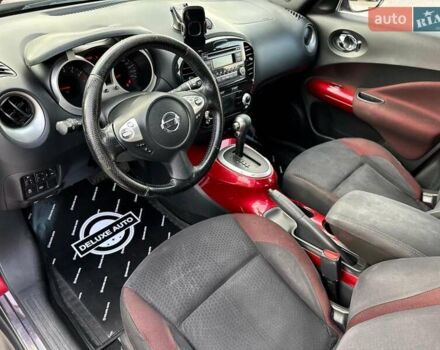 Червоний Ніссан Жук, об'ємом двигуна 1.6 л та пробігом 124 тис. км за 10200 $, фото 29 на Automoto.ua