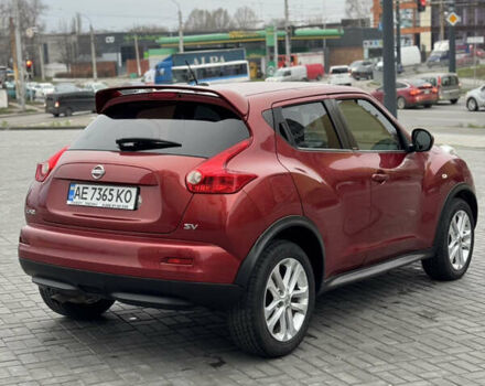 Червоний Ніссан Жук, об'ємом двигуна 1.6 л та пробігом 145 тис. км за 7700 $, фото 4 на Automoto.ua