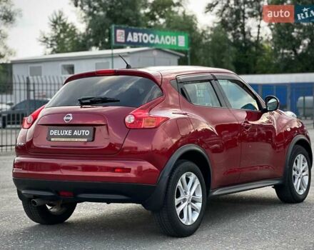 Червоний Ніссан Жук, об'ємом двигуна 1.6 л та пробігом 124 тис. км за 10200 $, фото 12 на Automoto.ua