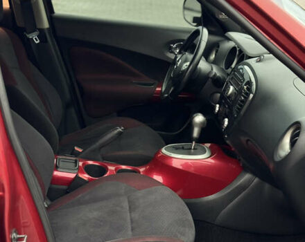 Червоний Ніссан Жук, об'ємом двигуна 1.6 л та пробігом 145 тис. км за 7700 $, фото 9 на Automoto.ua