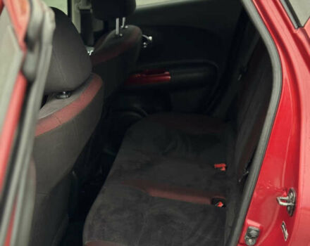 Червоний Ніссан Жук, об'ємом двигуна 1.6 л та пробігом 145 тис. км за 7700 $, фото 11 на Automoto.ua