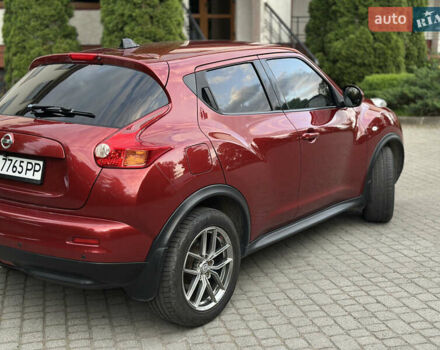 Червоний Ніссан Жук, об'ємом двигуна 1.6 л та пробігом 151 тис. км за 10000 $, фото 2 на Automoto.ua
