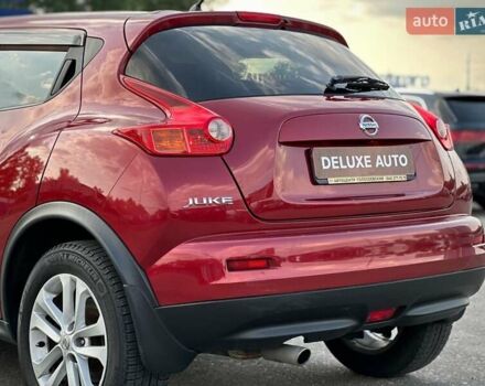 Червоний Ніссан Жук, об'ємом двигуна 1.6 л та пробігом 124 тис. км за 10200 $, фото 18 на Automoto.ua