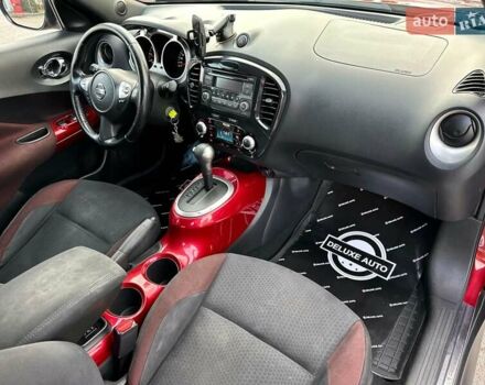 Червоний Ніссан Жук, об'ємом двигуна 1.6 л та пробігом 124 тис. км за 10200 $, фото 31 на Automoto.ua