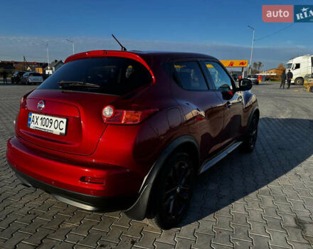 Красный Ниссан Жук, объемом двигателя 1.6 л и пробегом 119 тыс. км за 11700 $, фото 5 на Automoto.ua