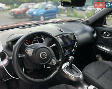 Червоний Ніссан Жук, об'ємом двигуна 1.6 л та пробігом 151 тис. км за 10000 $, фото 23 на Automoto.ua