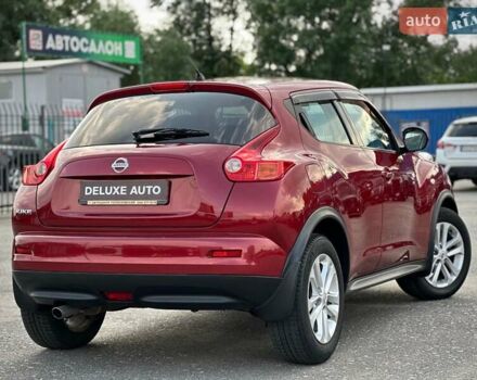 Червоний Ніссан Жук, об'ємом двигуна 1.6 л та пробігом 124 тис. км за 10200 $, фото 23 на Automoto.ua