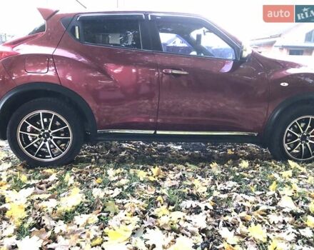 Красный Ниссан Жук, объемом двигателя 1.62 л и пробегом 131 тыс. км за 9900 $, фото 5 на Automoto.ua