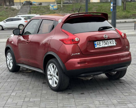 Червоний Ніссан Жук, об'ємом двигуна 1.6 л та пробігом 145 тис. км за 7700 $, фото 2 на Automoto.ua