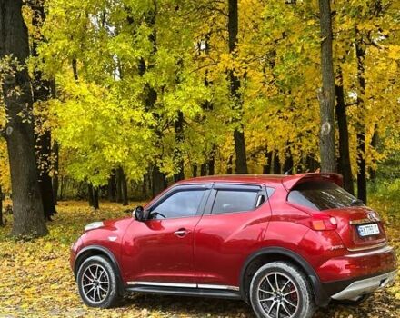 Красный Ниссан Жук, объемом двигателя 1.62 л и пробегом 131 тыс. км за 9900 $, фото 1 на Automoto.ua