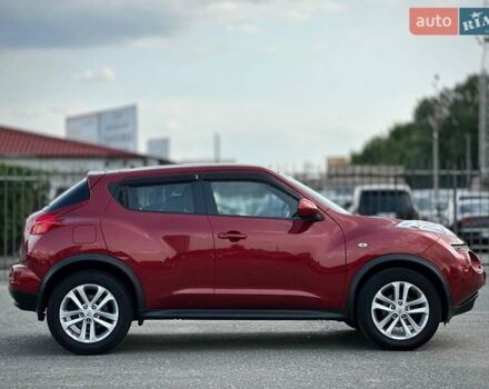 Червоний Ніссан Жук, об'ємом двигуна 1.6 л та пробігом 124 тис. км за 10200 $, фото 13 на Automoto.ua