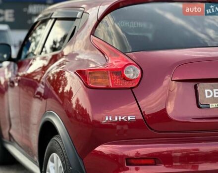 Червоний Ніссан Жук, об'ємом двигуна 1.6 л та пробігом 124 тис. км за 10200 $, фото 15 на Automoto.ua