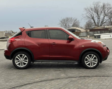 Червоний Ніссан Жук, об'ємом двигуна 1.6 л та пробігом 145 тис. км за 7700 $, фото 5 на Automoto.ua