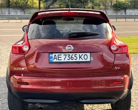 Красный Ниссан Жук, объемом двигателя 1.6 л и пробегом 90 тыс. км за 7999 $, фото 5 на Automoto.ua